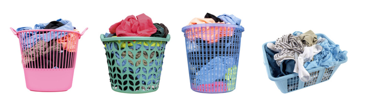 photograph of four different colorful plastic laundry baskets, each overflowing with various dirty clothes, illustrating household chores.