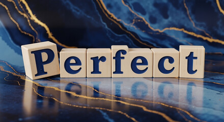 Wooden blocks spelling "Perfect" on blue and gold marble background  