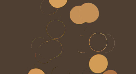 Obraz premium Golden bokeh lights on dark brown background