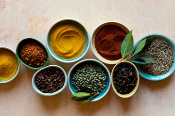 Mixed culinary spices turmeric powder peppercorn