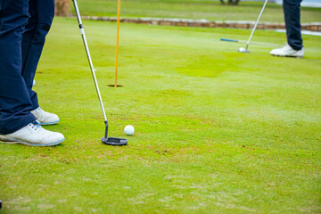 People, golfers enjoying on the golf course