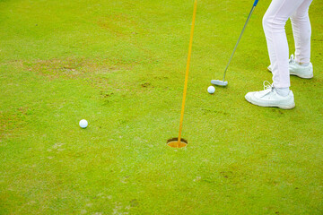 People, golfers enjoying on the golf course