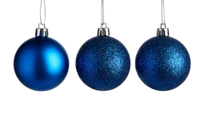 Festive Spheres: A trio of blue ornaments, each with unique textures, hang gracefully. Capture the essence of holiday cheer and decorative appeal.