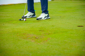 People, golfers enjoying on the golf course