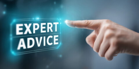 Human finger pressing glowing virtual button labeled "EXPERT ADVICE" in a futuristic digital interface, representing technology consulting and guidance concept
