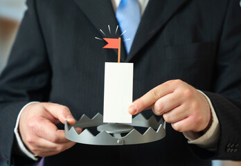 A business goal can be a trap and the end of a career if not achieved. Unrealistic targets, pressure from management, burnout risk. Accountability culture and consequences of strategic failure.