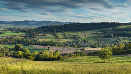 Landscape of the Land of Extinct Volcanoes at golden hour, Jozkowa Gora lookout point, Lower Silesia