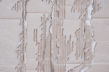 Torn Corrugated Cardboard Texture Background, Grunge Recycled Paper Texture with Peeling Layers.