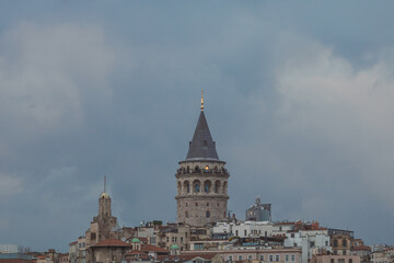 Fototapeta premium Galata Tower with overcast sky. Visit Istanbul concept