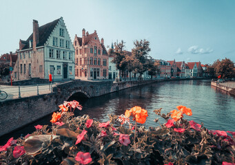 Naklejka premium Historic medieval city of Bruges, Belgium. Beautiful scenic view of canals, ancient architecture and landmarks in the Venice of the North.