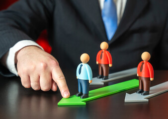 An office worker is taking the lead. A favorite for promotion. Career advancement moment, leadership potential. Recognition of performance and competitive workplace dynamics inside a company.