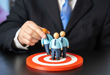 A business leader puts the team of employees at the center of attention. Assemble the team. The focus is on an effective team. Leadership priorities, talent alignment. Collaboration culture