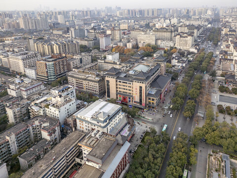 Aerial view of the grand Tang Paradise complex with its traditional architecture amidst modern buildings, Xi'An, Shaanxi, China.