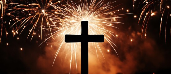 Christian Cross Silhouette with Golden Fireworks Display Symbolizing Faith and Celebration