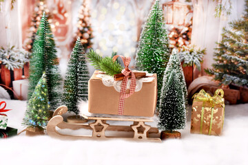 Christmas gift box on the sled on a winter day