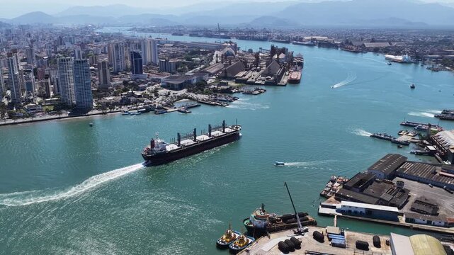 Freight Ship At Santos In Sao Paulo Brazil. Port Of Santos Scenery. Cargo Ship. Maritime Transportation. Freight Ship At Santos. Freight Ship Sailing.