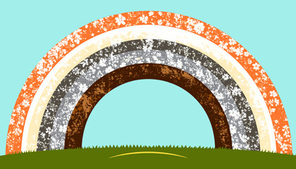 Colorful rainbow arching over a green hill against a blue sky.