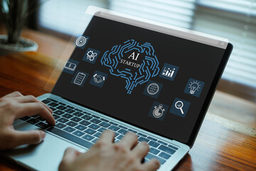 Futuristic AI startup concept featuring a glowing digital brain above a laptop as a businessman interacts with the device, surrounded by icons of analytics, global technology, and business strategy.