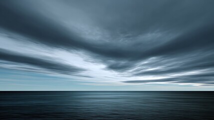 Obraz premium Calm sea horizon coastal landscape tranquil nature scene overcast sky serene viewpoint