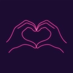 A glowing pink neon heart shape formed by hands against a dark brick wall backdrop and dark background