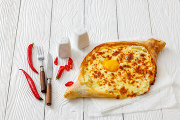 Adjarian Khachapuri with egg yolk and cheese