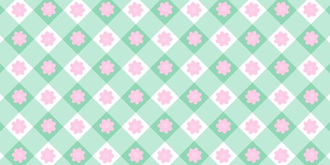 Seamless pastel floral argyle pattern with pink flowers on mint green and white diamond shapes. Cute repeating background for wallpaper, fabric, wrapping paper, and spring designs.