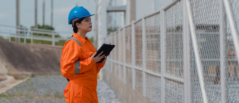 Electrical engineers are checking the operation and power distribution systems within the substation receiving power from the wind farm.