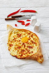 Adjarian Khachapuri with egg yolk and cheese