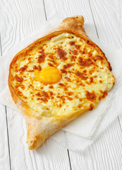 Adjarian Khachapuri with egg yolk and cheese