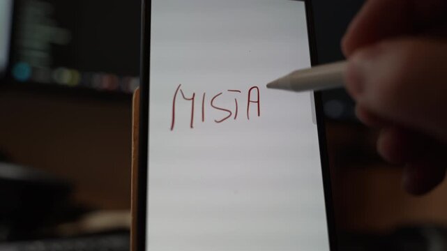 Close view of the misspelled word MISTAKKE handwritten with a stylus on a smartphone screen highlighting error awareness learning and correction concept through digital note taking indoors