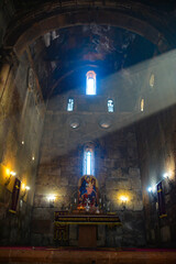 Monastery interior. An old lamp in the church. Sunlight streaming through the windows. Christianity and religion.