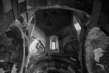 Monastery interior. An old lamp in the church. Sunlight streaming through the windows. Christianity and religion.