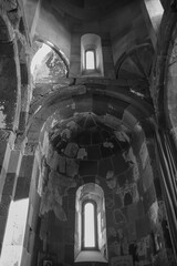Monastery interior. An old lamp in the church. Sunlight streaming through the windows. Christianity and religion.