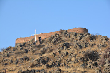 Fortress on a hilltop. Ruined castle. Old architecture.