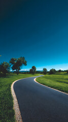 Minimalist Landscape with Curved Road and Clear Sky