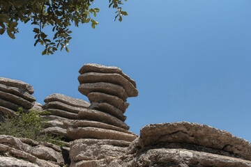 Natural Monument El Tornillo del Torcal, iconic karstic formation created by the differential erosion of limestone strata. Torcal de Antequera, Malaga, Spain