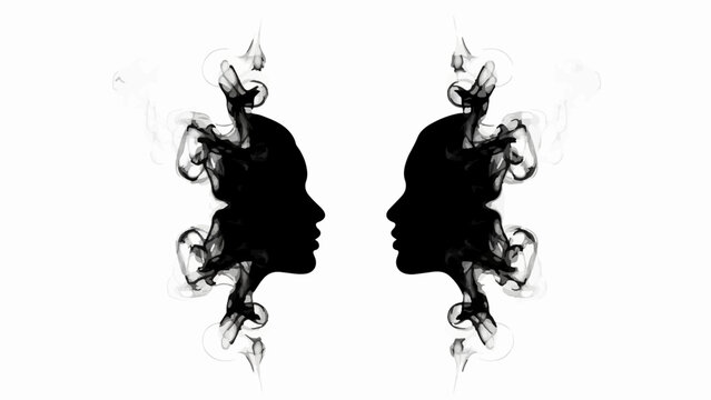 Abstract ink splatters form symmetrical profiles of two facing heads against a white background