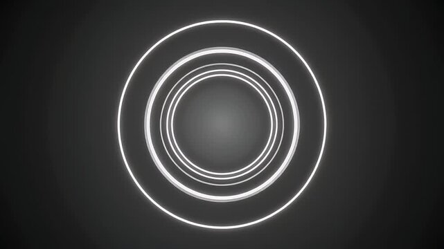 A dark, abstract image featuring concentric white neon-like rings against a black background. The rings gradually decrease in size towards the center