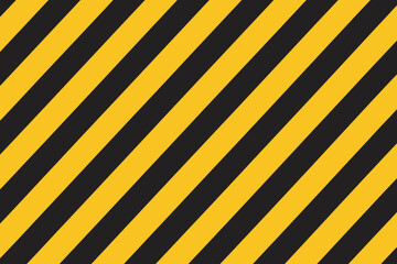 Diagonal black and yellow warning stripes create a bold geometric pattern.