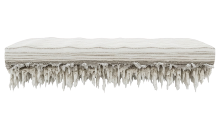 Frozen ice formation with layered texture and icicles hanging down isolated on transparent background