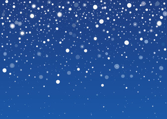 Fototapeta premium A serene blue background with scattered white snowflakes falling gently down