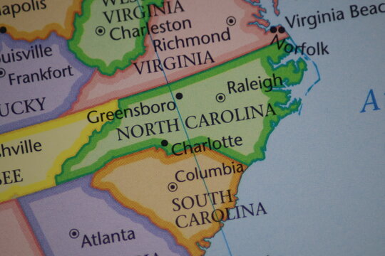 North and South Carolina US States on Political Map Close-up View - Macro Shot of Raleigh Charlotte and Virginia Borders for Education and East Coast Travel Concepts