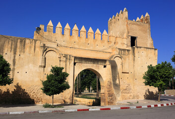 Fez, Morocco. Medieval defensive wall and city gate in the palace area of the city. 