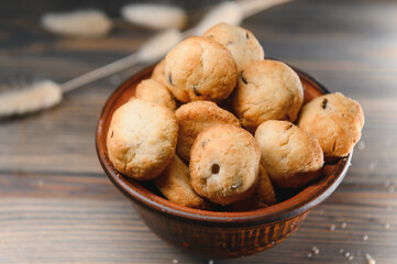 Fresh pastries. Delicious cookies on a wooden background