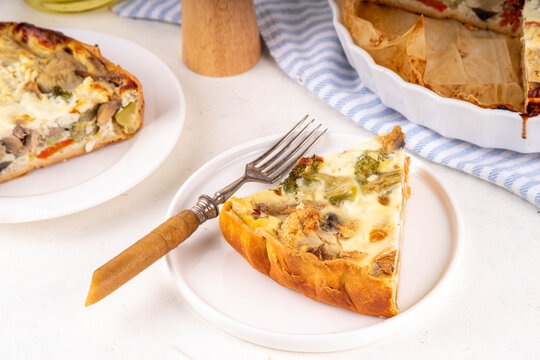 Vegan quich tart pie with various summer seasonal vegetables