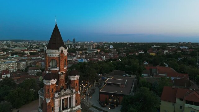 Aerial view of Gardos Tower, a historic landmark, standing tall amidst a cityscape with red rooftops and a serene river backdrop, Belgrade, City of Belgrade, Serbia.