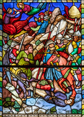 Perugia -  The martyrdom of eartly christian matryrs in church Chiesa di San Domenico  on the stained glass designed by Mariotto di Nardo and made by Bartolomeo di Pietro (1411).