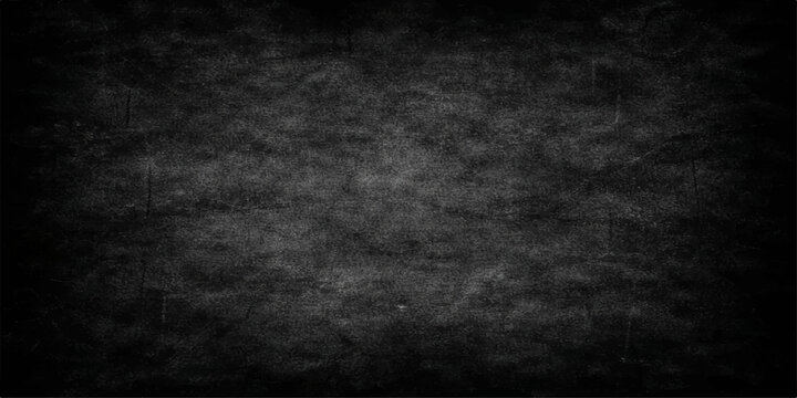 A dark and black grunge background featuring a vintage textured wall with a rough grey stone concrete surface and an empty aged chalkboard frame for a dirty paper backdrop