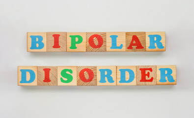 Word Bipolar Disorder shown using colorful wooden cubes