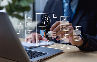 HR manager analyzing digital resumes through virtual platform, showcasing online hiring, talent assessment, HR analytics, and recruitment technology.